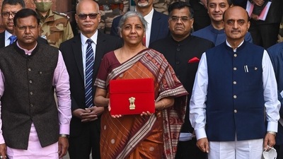 India's Finance Minister Nirmala Sitharaman carrying a bag leaves the ministry of finance to present the annual budget at the parliament in New Delhi. (AFP) India's Finance Minister Nirmala Sitharaman carrying a bag leaves the ministry of finance to present the annual budget at the parliament in New Delhi. (AFP)