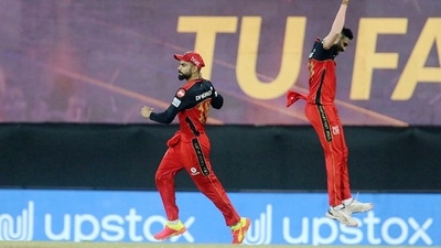 Mohammed Siraj and Virat Kohli celebrate (PTI) Mohammed Siraj and Virat Kohli celebrate (PTI)