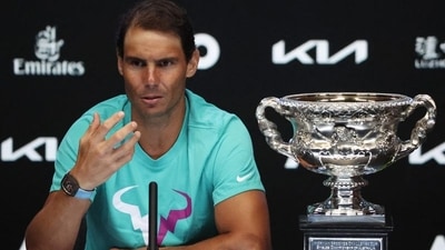 Spain's Rafael Nadal sits alongside the trophy during a press conference after winning the final against Russia's Daniil Medvedev&nbsp; (REUTERS)