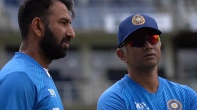 Cheteshwar Pujara (L) with Rahul Dravid. (BCCI/Twitter) Cheteshwar Pujara (L) with Rahul Dravid. (BCCI/Twitter)