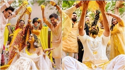 On Tuesday, Mouni took to Instagram to post several pictures from her and Suraj's haldi ceremony and captioned it, "Happyyyyyy haldi facesss." It features the guests with the bride and groom having loads of fun playing with flowers and dancing to their hearts fill. Some photos also captured PDA moments between Mouni and Suraj, who wore pretty white ensembles. (Instagram/@imouniroy)