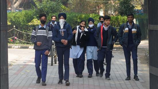 Students leaving after attending classes at Government Model Senior Secondary School in Sector 32, Chandigarh, on Monday. (Ravi Kumar/HT)