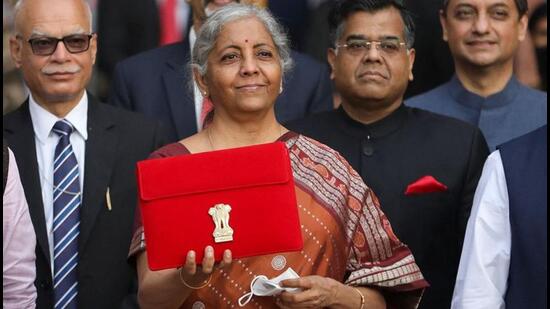 India's Finance Minister Nirmala Sitharaman holds up a folder with the Government of India’s logo as she leaves her office to present the federal budget in the parliament in New Delhi, India, February 1, 2022. REUTERS/Anushree Fadnavis (REUTERS)