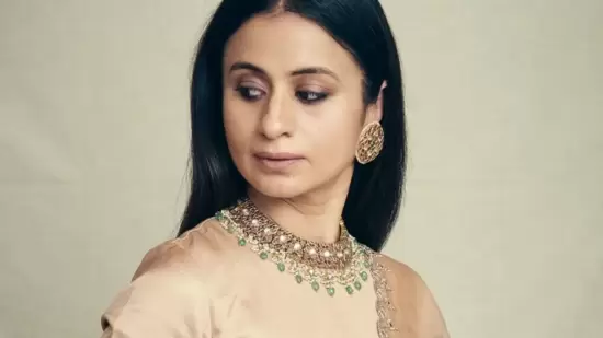 Taking to her social media handle, Rasika shared a slew of pictures from a photoshoot where she was featured donning a half sleeves satin silk blouse that came in peach brown colour and a simple round-neck.(Instagram/rasikadugal)