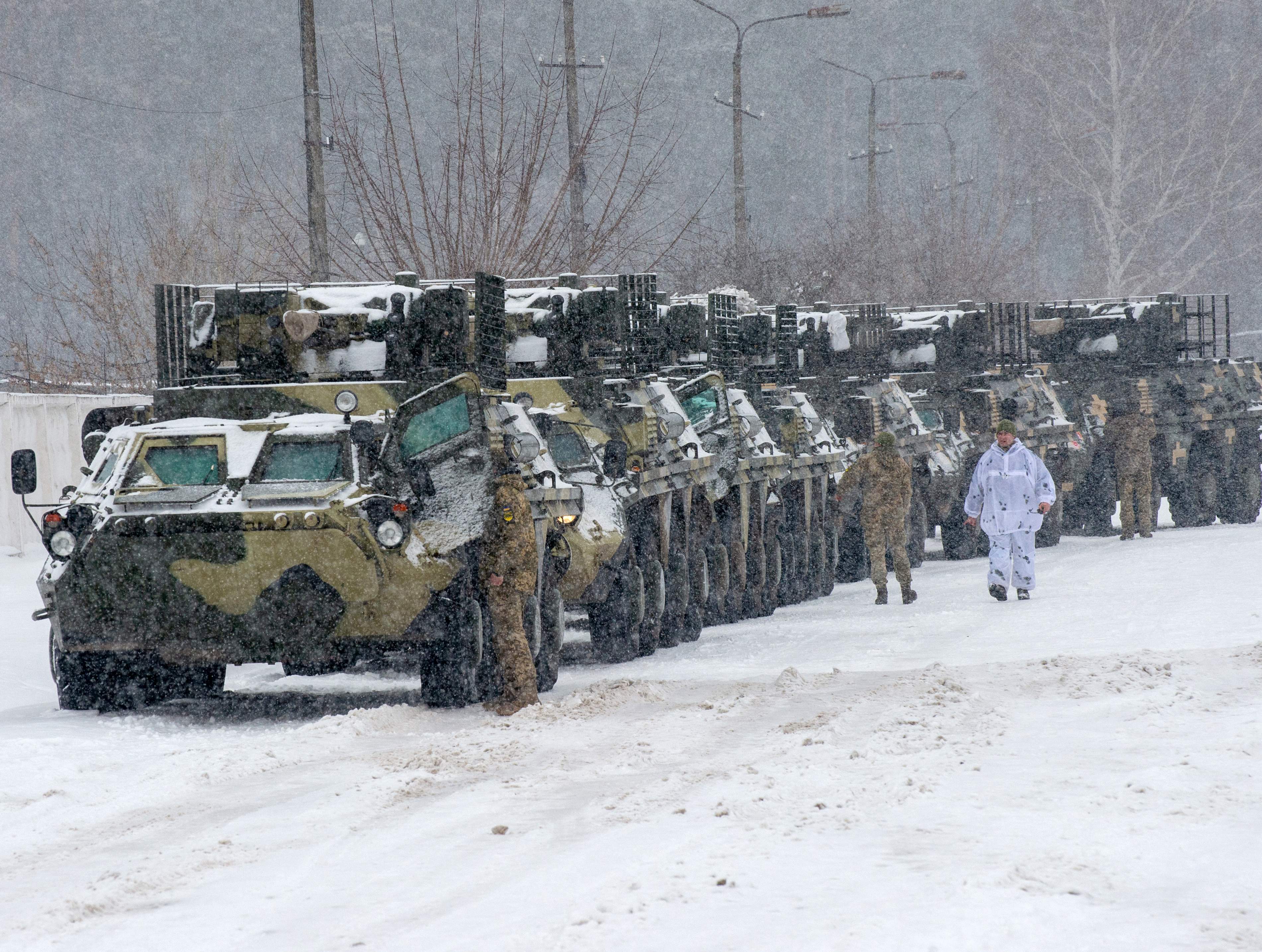 Armored personnel carrier (APC) of the 92nd separate mechanized brigade of Ukrainian Armed Forces move to park in their base near Klugino-Bashkirivka village, in the Kharkiv region on Jan 31, 2022. (AFP Photo) Armored personnel carrier (APC) of the 92nd separate mechanized brigade of Ukrainian Armed Forces move to park in their base near Klugino-Bashkirivka village, in the Kharkiv region on Jan 31, 2022. (AFP Photo)