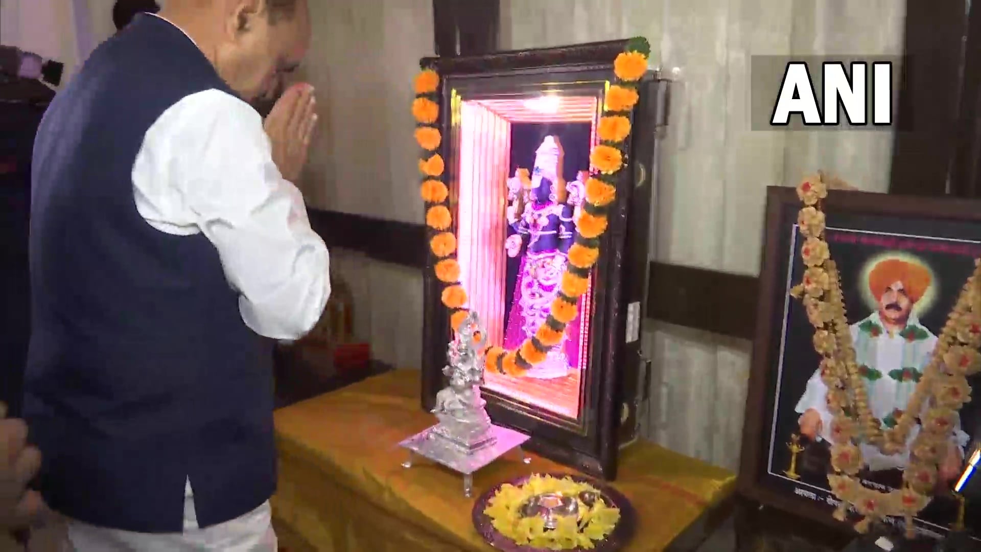 Before leaving his residence, Minister of state for finance Bhagwat Karad offered prayers. Before leaving his residence, Minister of state for finance Bhagwat Karad offered prayers. 