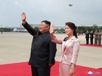 North Korean leader Kim Jong Un and his wife Ri Sol Ju wave to Chinese President Xi Jinping and his wife Peng Liyuan during Xi's visit in Pyongyang, (File photo)