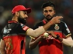 Virat Kohli (L) and Mohammed Siraj Virat Kohli (L) and Mohammed Siraj 