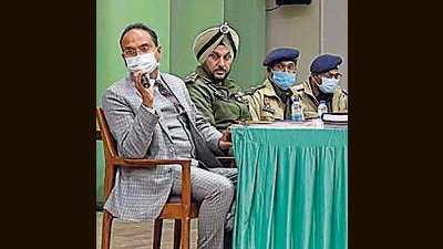 The returning officers briefed election observers regarding their respective assembly constituencies during the meet in Ludhiana. (HT Photo) The returning officers briefed election observers regarding their respective assembly constituencies during the meet in Ludhiana. (HT Photo)