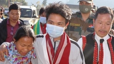Miram Taron (centre) with his parents at Tuting in Arunachal Pradesh on Monday. (PHOTO: Spear Corps-Indian Army .) Miram Taron (centre) with his parents at Tuting in Arunachal Pradesh on Monday. (PHOTO: Spear Corps-Indian Army .)