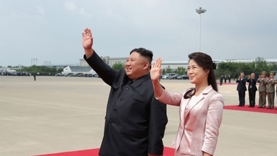 North Korean leader Kim Jong Un and his wife Ri Sol Ju wave to Chinese President Xi Jinping and his wife Peng Liyuan during Xi's visit in Pyongyang, (File photo) (REUTERS)