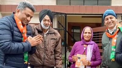 BJP candidate Sanjeev Vashisht during a door-to-door campaign at Phase 5 in Mohali on Wednesday. (HT Photo) BJP candidate Sanjeev Vashisht during a door-to-door campaign at Phase 5 in Mohali on Wednesday. (HT Photo)