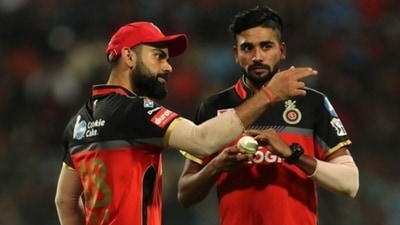 Virat Kohli (L) and Mohammed Siraj (IPL) Virat Kohli (L) and Mohammed Siraj (IPL)