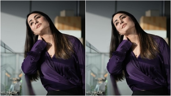 Hina flaunted her bright smile, twirled happily, flipped her hair, and posed while soaking up the sun in the beautiful balcony shoot. Additionally, she wore a chic silk satin purple blouse and black bottoms for the photoshoot.(Instagram/@realhinakhan)