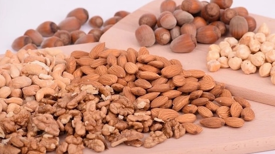 Nuts like almonds, cashews, pistachios are loaded with essential nutrients. Just a handful of them in your everyday diet can do wonders to your hair. All you have to do is to replace your regular unhealthy snacks with these nutrition-packed alternatives.(Pixabay)