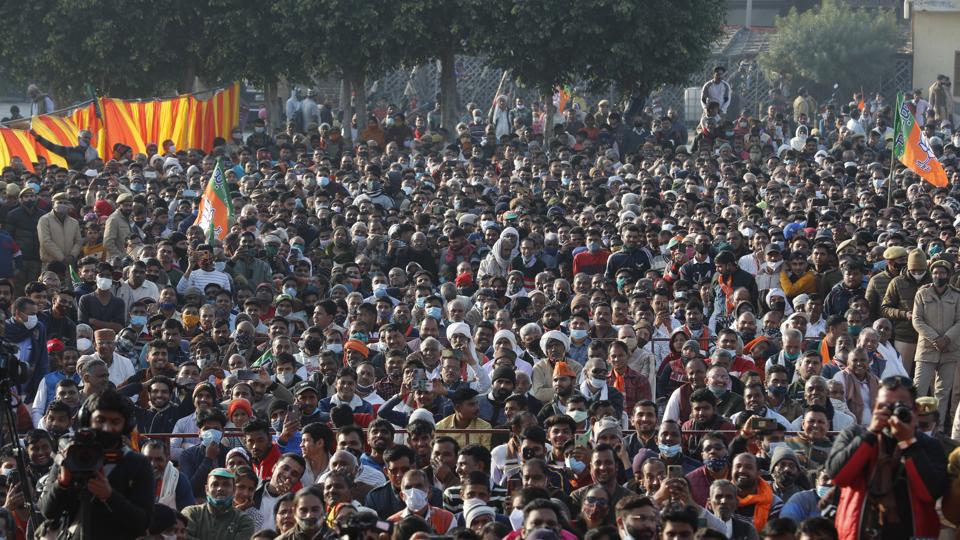 People listen to Uttar Pradesh chief minister Yogi Adityanath at an election rally at Dhaulana in Hapur district on January 30. (AP) People listen to Uttar Pradesh chief minister Yogi Adityanath at an election rally at Dhaulana in Hapur district on January 30. (AP)