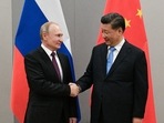 Russia's president Vladimir Putin shakes hand with his Chinese counterpart, Xi Jinping. Russia's president Vladimir Putin shakes hand with his Chinese counterpart, Xi Jinping. 