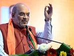 Union Home Minister Amit Shah addressing a public rally, in Ponda on Sunday. (ANI)