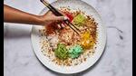 Yee Sang (the prosperity toss) is cantonese-style raw fish salad and considered a symbol of abundance, prosperity and vigor.