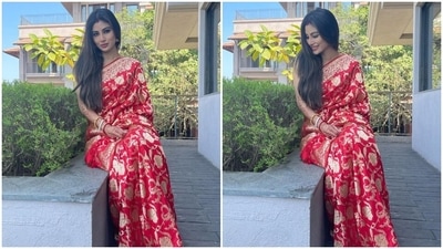 Bengali beauty Mouni Roy made headlines for her lavish intimate wedding with Dubai-based Suraj Nambiar last week in Goa. Pictures of the ceremony went viral on social media and fans couldn't keep calm looking at the actor in her bridal attire. The actor wore the traditional Bengali lal paar sada saree with a little South-Indian touch for the morning pheras and later at night, Mouni donned a gorgeous Sabyasachi lehenga. Post her wedding, the Gold actor was spotted draped in a red silk Benarasi saree. (Instagram/@imouniroy) Bengali beauty Mouni Roy made headlines for her lavish intimate wedding with Dubai-based Suraj Nambiar last week in Goa. Pictures of the ceremony went viral on social media and fans couldn't keep calm looking at the actor in her bridal attire. The actor wore the traditional Bengali lal paar sada saree with a little South-Indian touch for the morning pheras and later at night, Mouni donned a gorgeous Sabyasachi lehenga. Post her wedding, the Gold actor was spotted draped in a red silk Benarasi saree. (Instagram/@imouniroy)