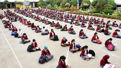 Students attend classes outdoors in the school premises as they maintain social distancing and following other Covid-19 protocols. (ANI) Students attend classes outdoors in the school premises as they maintain social distancing and following other Covid-19 protocols. (ANI)