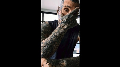 The image is taken from the video showing the man and his insect tattoo-related record. (Instagram/@guinnessworldrecords)