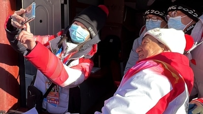 Table tennis Olympic gold medallists Ma Long and Wu Jingyu, a two-time gold medallist in taekwondo, were among those carrying the red-and-silver spiral torch along the Badaling section of the Great Wall, where the Thursday morning temperature was a bracing -11 Celsius (12 Fahrenheit). (REUTERS)