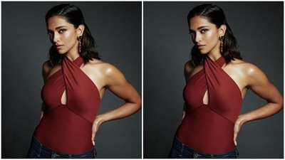 Deepika paired a maroon top with a pair of denims. (Instagram/@deepikapadukone)