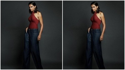 Deepika's top came with midriff-baring halter neck details. She teamed it with a pair of dark blue jeans with wide legs. (Instagram/@deepikapadukone)