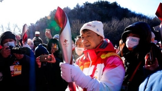 Actor Jackie Chan on Thursday took part in the Winter Olympics torch relay at the Badaling Great Wall on the outskirts of Beijing, China and carried the flame along a route shortened to three days because of Covid-19.&nbsp;(AP)