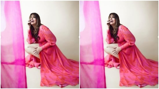 Huma's satin pink and red gown came with midriff-baring details, dramatic sleeves and a one-thigh slit. Huma paired it with a pair of pink comfy slippers.(Instagram/@iamhumaq)