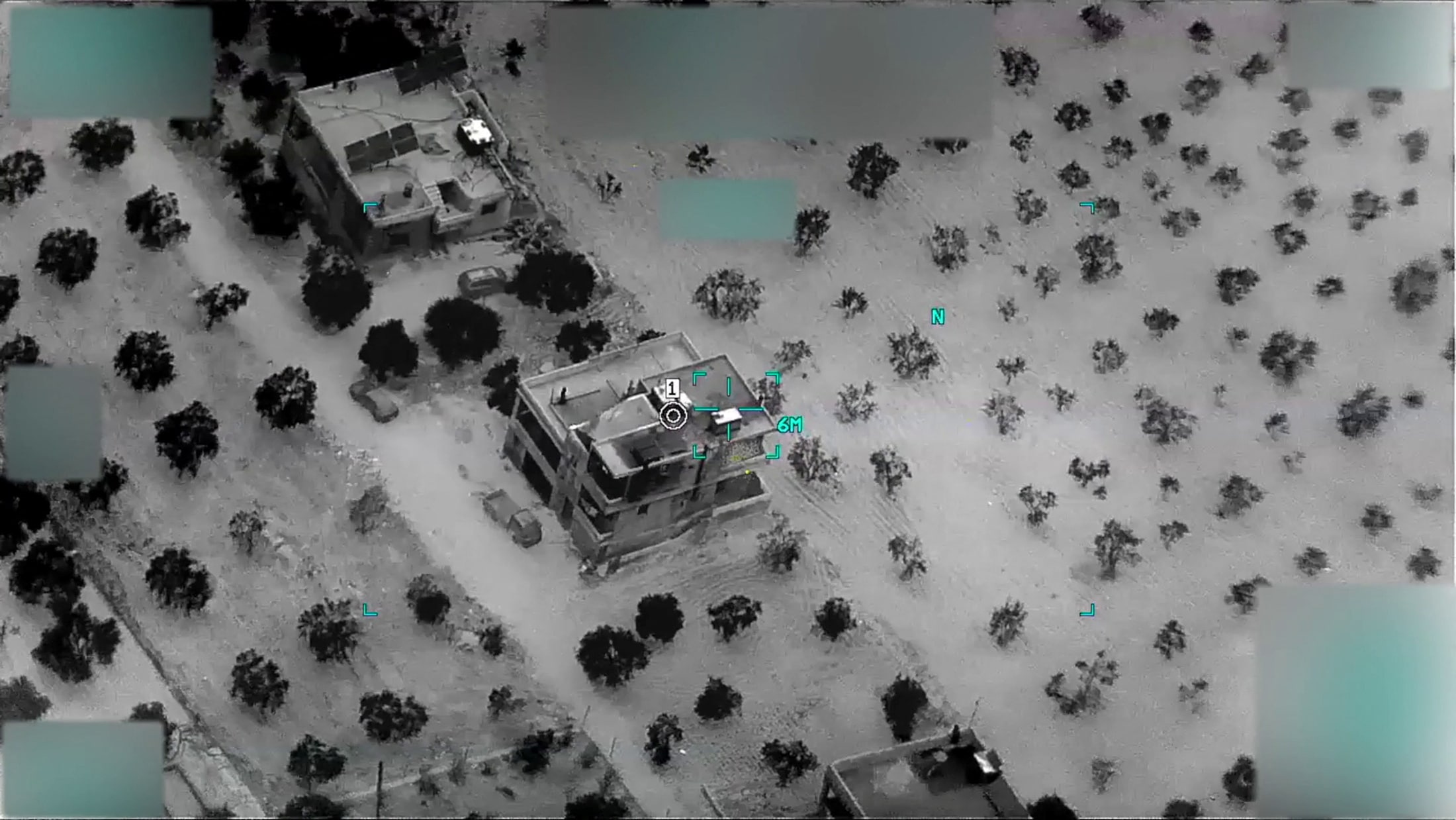 A suveillance image shows a compound housing the leader of the Islamic State jihadist group Abu Ibrahim al-Hashemi al-Quraishi. (via Reuters)