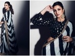 Parineeti Chopra is all set to make heads turn on the show Hunarbaaz Desh ki Shaan donning a stunning black and ivory stripes saree by ace designer Masaba Gupta.(Instagram/@parineetichopra)