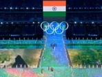Skier Arif Khan carries Indian flag at the Winter Olympics opening ceremony