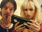 Sebastian Stan and Lily James in a still from Pam & Tommy. Sebastian Stan and Lily James in a still from Pam & Tommy.