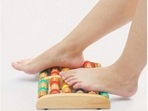 Wooden roller foot massagers help relieve pain and stress.&nbsp;