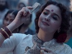 Alia Bhatt and Ajay Devgn in stills from Gangubai Kathiawadi trailer. Alia Bhatt and Ajay Devgn in stills from Gangubai Kathiawadi trailer.