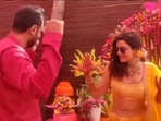 Karishma Tanna and Varun Bangera dance together at their mehendi ceremony.