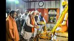 UP chief minister Yogi Adityanath with Union home minister Amit Shah offers prayers before filing his nomination papers for upcoming Assembly elections, in Gorakhpur. (PTI Photo) UP chief minister Yogi Adityanath with Union home minister Amit Shah offers prayers before filing his nomination papers for upcoming Assembly elections, in Gorakhpur. (PTI Photo)