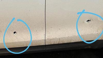 Bullet marks on AIMIM leader Asaduddin Owaisi’s car as seen in Ghaziabad on Thursday. (HT photo)