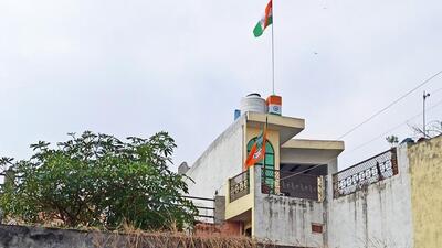 A Tricolour and a BJP flag on Sachin Sharma’s rooftop. (Sourced) A Tricolour and a BJP flag on Sachin Sharma’s rooftop. (Sourced)
