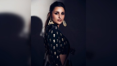 Parineeti Chopra's drape featured broad black and ivory stripes and a thick embellished border. It comes with a gold foil printed black blouse. (Instagram/@parineetichopra) Parineeti Chopra's drape featured broad black and ivory stripes and a thick embellished border. It comes with a gold foil printed black blouse. (Instagram/@parineetichopra)