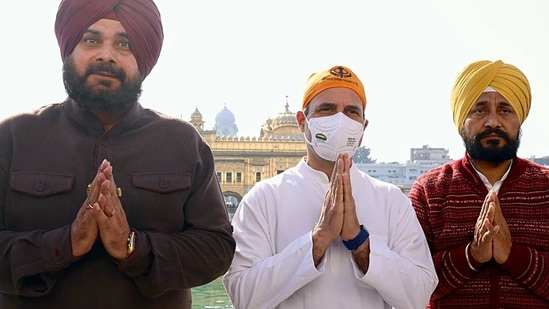 Congress leader Rahul Gandhi with Punjab Chief Minister Charanjit Singh Channi and party State chief Navjot Singh Sidhu pays obeisance at the Golden Temple, in Amritsar on Thursday. (ANI)