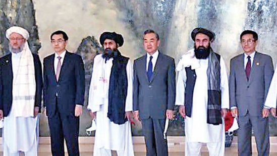 Taliban Deputy PM Mullah Baradar with Chinese Foreign Minister Wang Yi in China.
