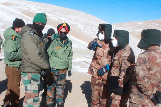 Army officers of India and China hold a meeting at Pangong lake region in Ladakh on the India-China border on Feb. 10, 2021. (via AP) Army officers of India and China hold a meeting at Pangong lake region in Ladakh on the India-China border on Feb. 10, 2021. (via AP)