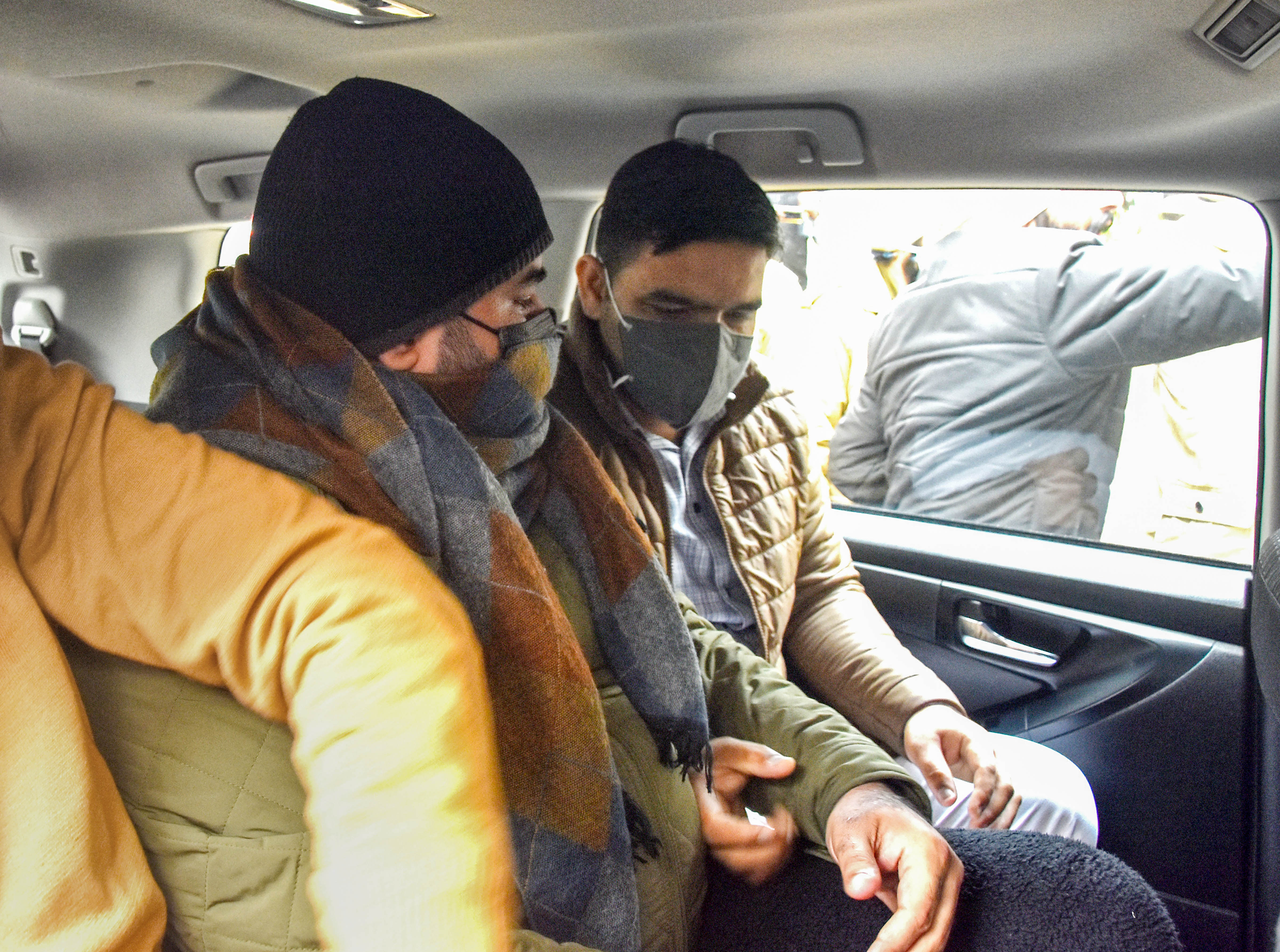 Bhupinder Singh Honey, the nephew of Punjab Chief Minister Charanjit Singh Channi, being taken by the ED to a court on Friday. (PTI) Bhupinder Singh Honey, the nephew of Punjab Chief Minister Charanjit Singh Channi, being taken by the ED to a court on Friday. (PTI)