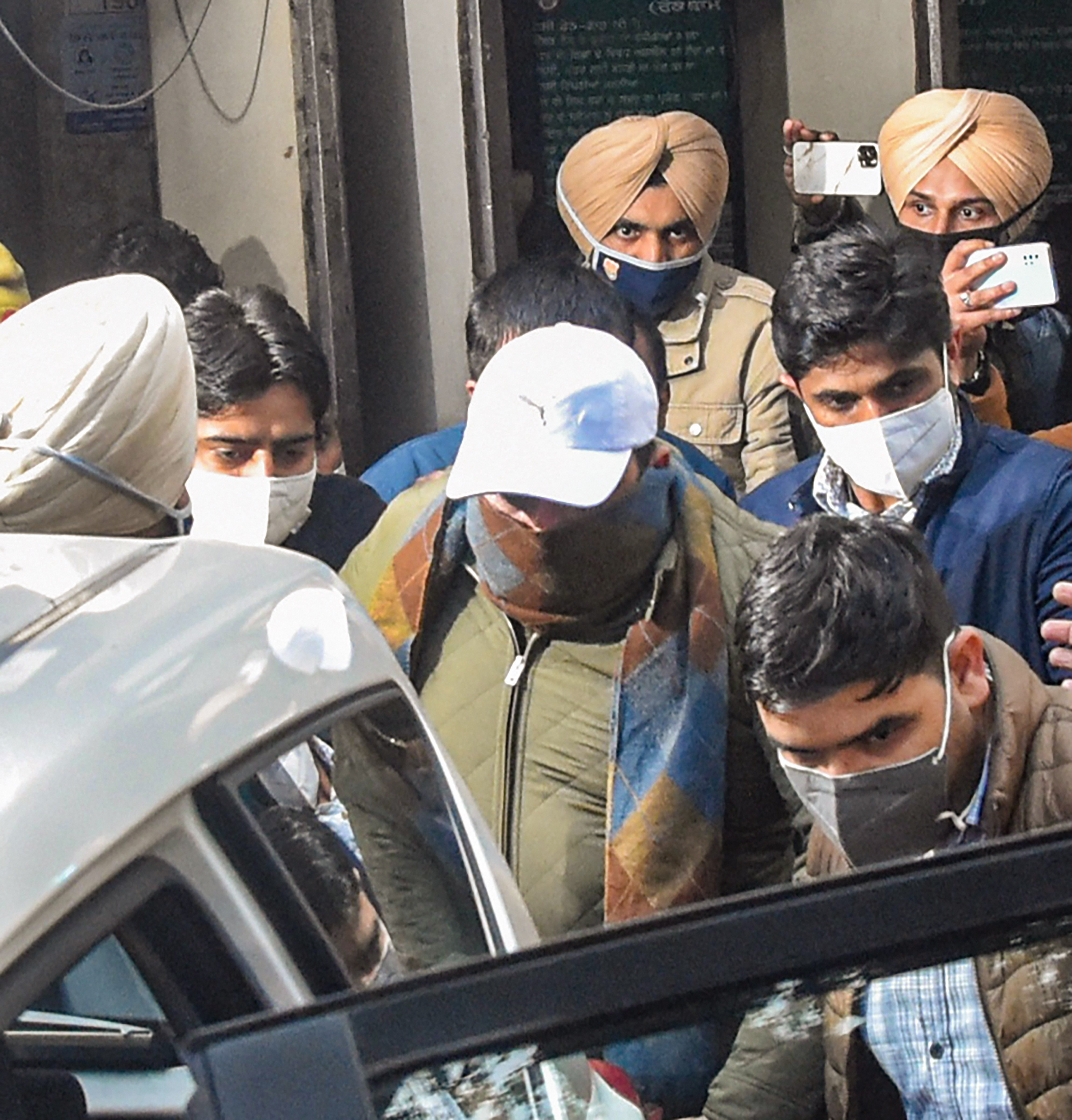 Bhupinder Singh Honey being brought for medical examination after his arrest by the ED, in Jalandhar on Friday. (PTI)