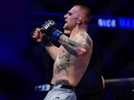 Nick Maximov reacts after being declared the winner by decision against Cody Brundage during UFC 266(USA TODAY Sports) Nick Maximov reacts after being declared the winner by decision against Cody Brundage during UFC 266(USA TODAY Sports)