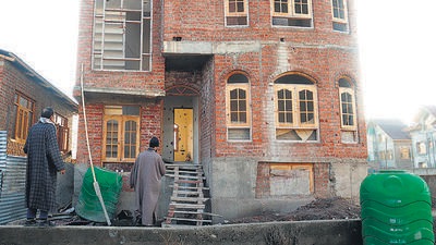People gather at the site of the encounter in Zakura area of Srinagar on Saturday (ANI) People gather at the site of the encounter in Zakura area of Srinagar on Saturday (ANI)