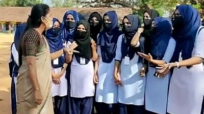 Students wearing hijab denied entry to Government PU College, in Karnataka's Kundapur on Friday. (ANI) Students wearing hijab denied entry to Government PU College, in Karnataka's Kundapur on Friday. (ANI)